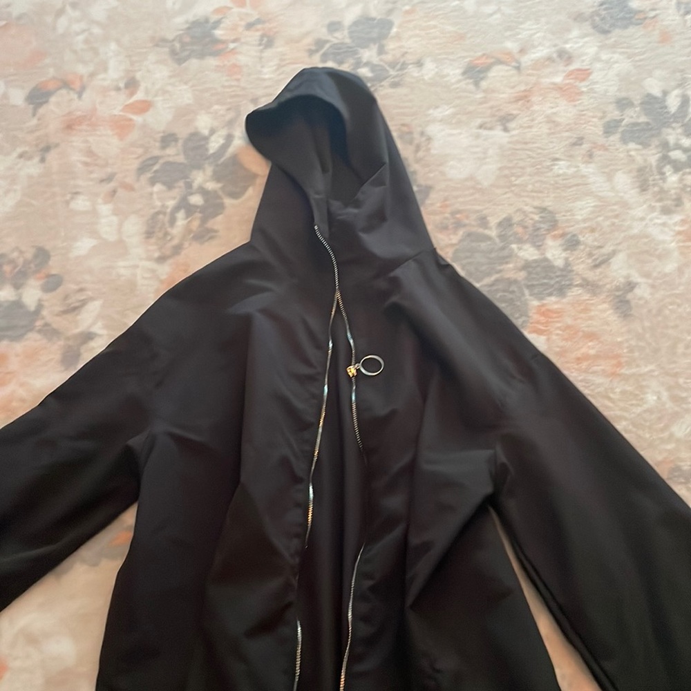 Black windbreaker